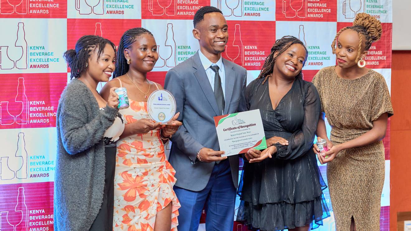 African Originals staff showing off their awards and products. PHOTO/COURTESY